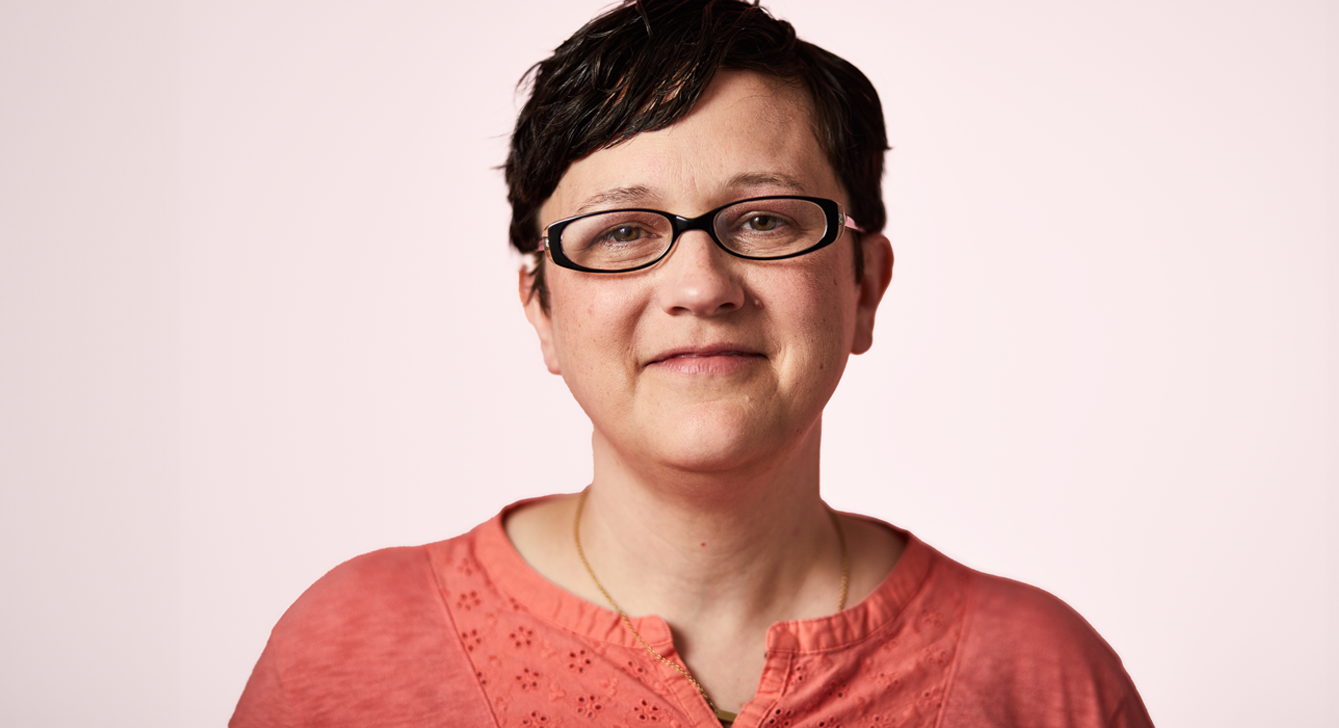 Headshot image of breast cancer survivor and Gateway to Hope recipient named Marci.